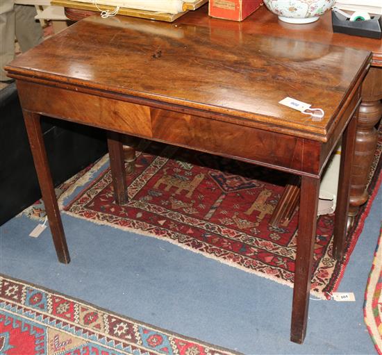 A George III mahogany card table W.91cm